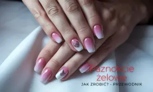 Dłonie z paznokciami w stylu ombre, z różowym gradientem i błyszczącymi serduszkami. Idealne uzupełnienie hybrydy.