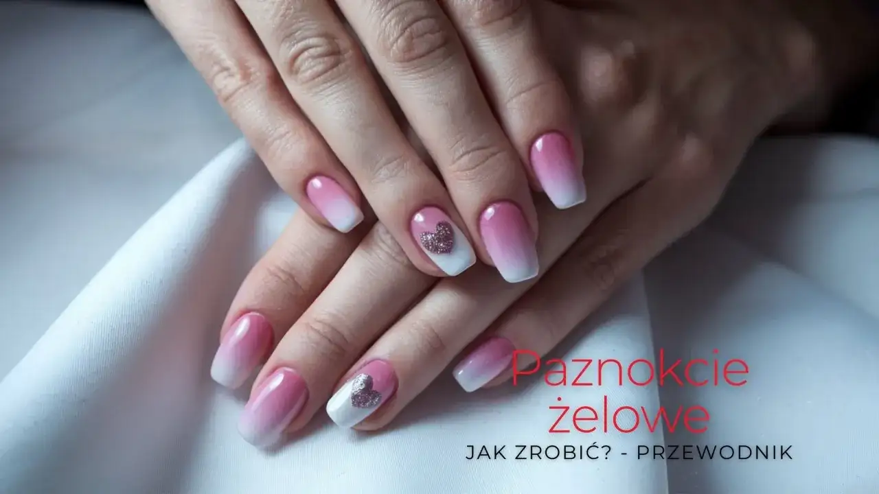 Dłonie z paznokciami w stylu ombre, z różowym gradientem i błyszczącymi serduszkami. Idealne uzupełnienie hybrydy.